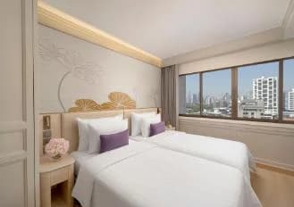 센터 포인트 수쿰빗 10 호텔 침실