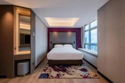 나우미 호텔 싱가포르 침실